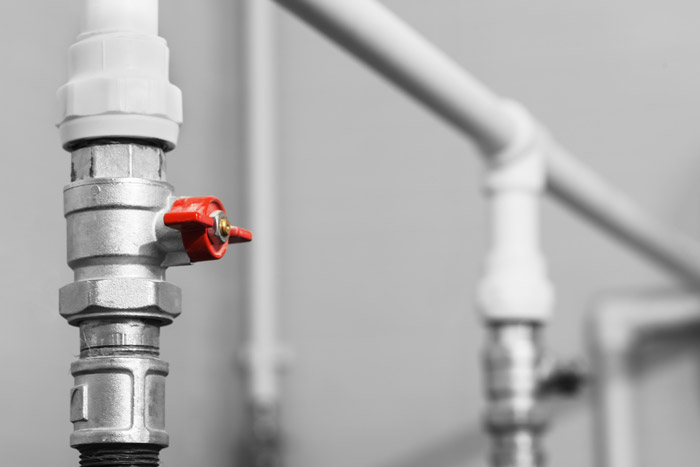 Shut off valve on a home water supply line during leak detection in Wake Forest, NC