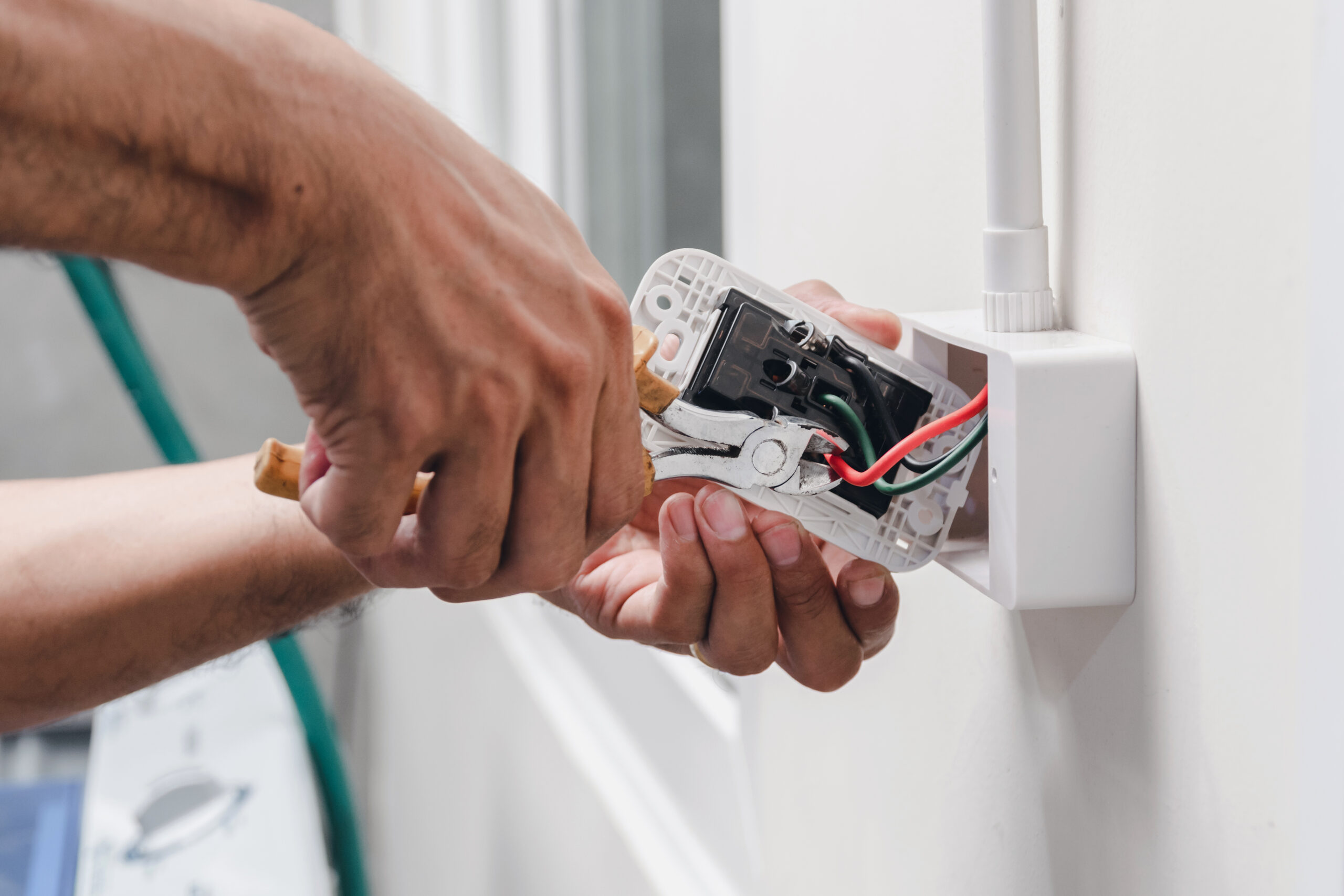 Licensed electrician installing a dedicated circuit for home EV charging in Wake Forest, NC