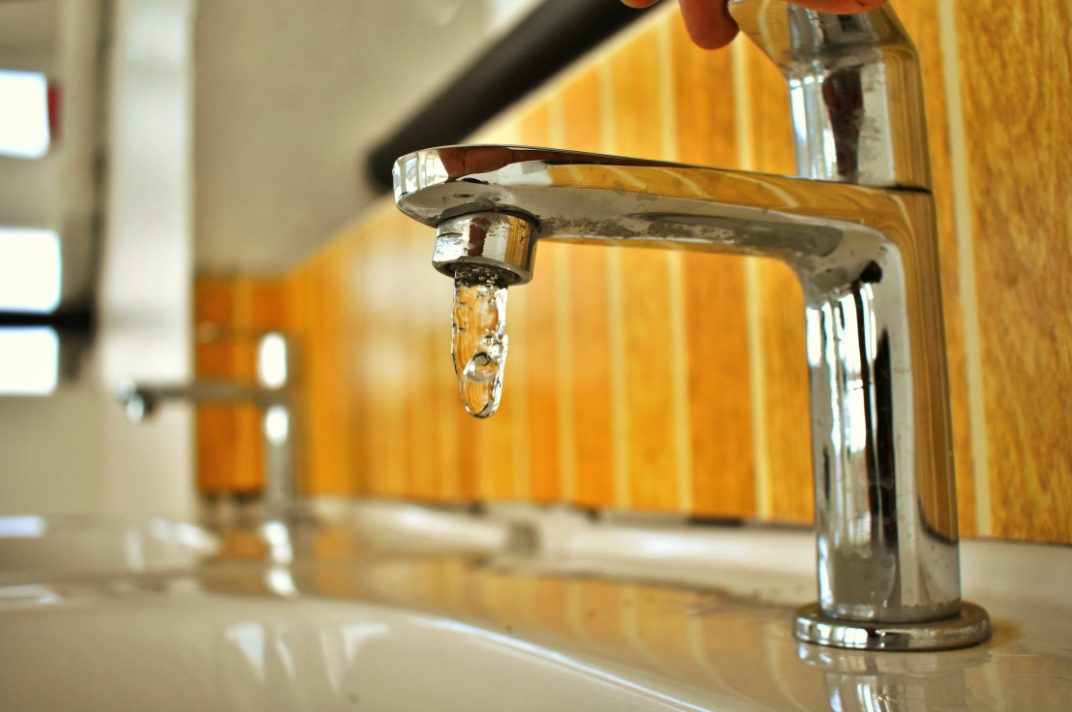 Dripping bathroom sink faucet with a worn cartridge needing faucet repair in Wake Forest, NC